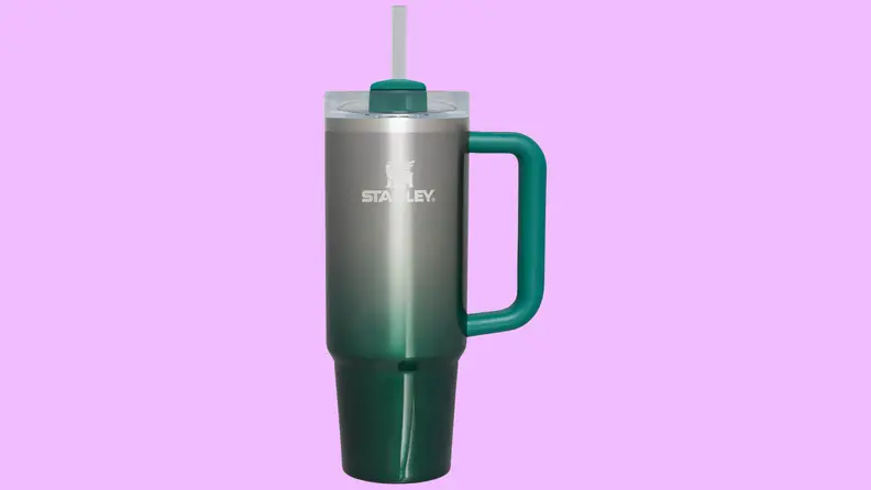A green and silver Stanley tumbler.