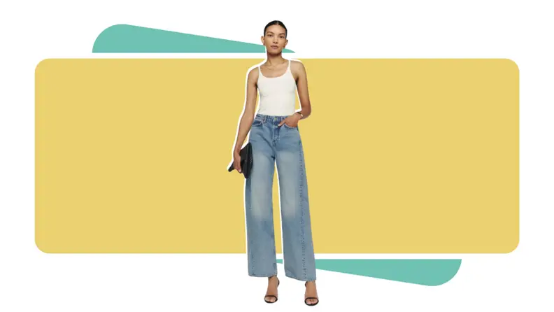 A model wearing blue jeans with a white top.