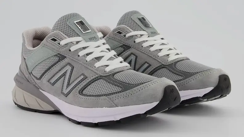 Grey pair of New Balance 990v5 sneakers.
