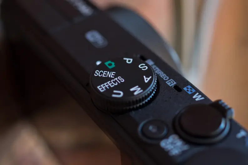 A photograph of the Nikon Coolpix P340's mode dial.