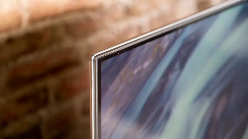 A close-up of the silver accent on the Amazon Fire TV Omni's panel