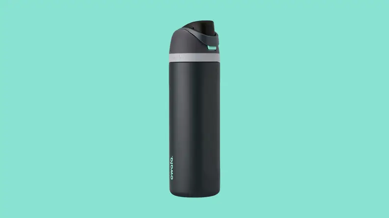 Black water bottle against teal background