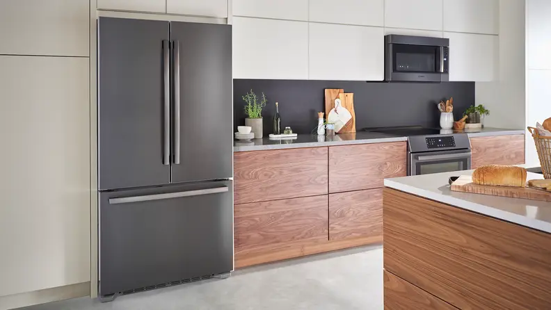 A Bosch French door refrigerator in black stainless steel