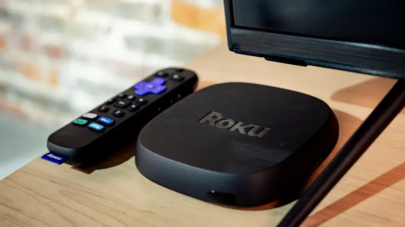 Black Roku streaming device with remote