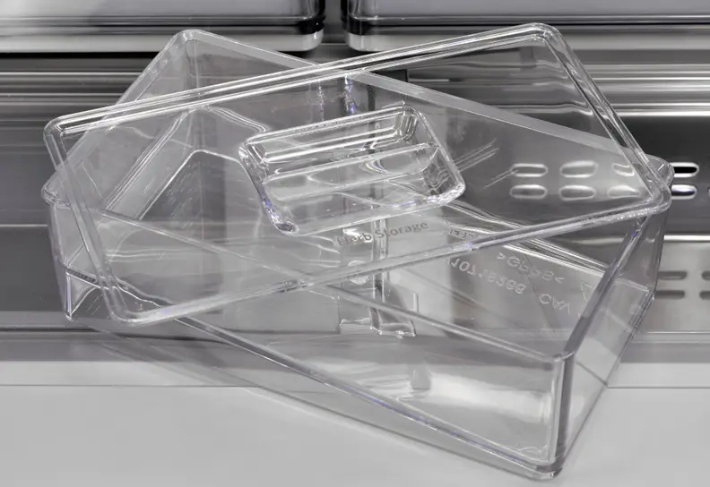 The KitchenAid KRMF706EBS's herb tray features a sloped interior. Stems can sit in a small pool of water while the leaves stay dry.