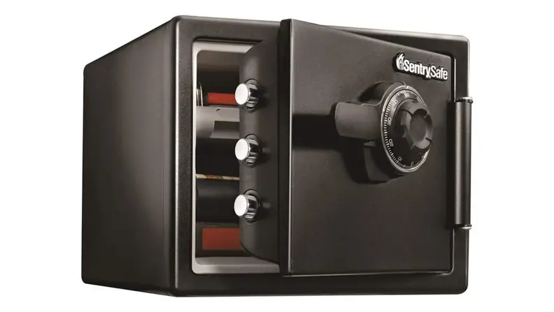 A fireproof safe on a white backdrop