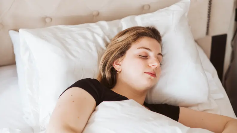 The author sleeping on the Brooklinen Mulberry Silk Pillowcase.