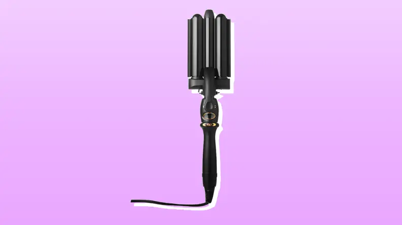 One of the best hair wavers from Amika in front of a purple background.