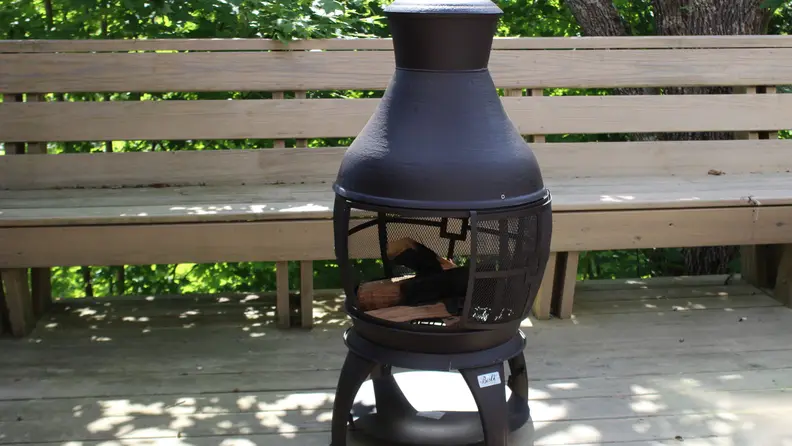 Bali Outdoors Chiminea sitting on a wood deck