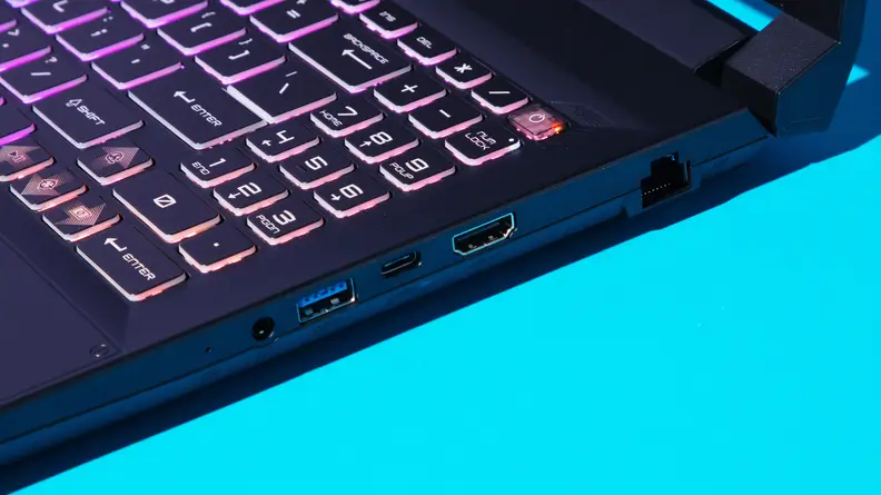 A close up of the side ports of a laptop.