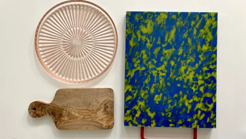 From wooden cutting board to colored glass plate, there are endless options for the base of your cheese board.