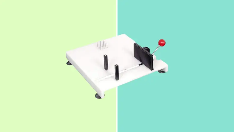 The Etac Cutting board in front of a background.