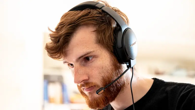 A man wearing a gaming headset