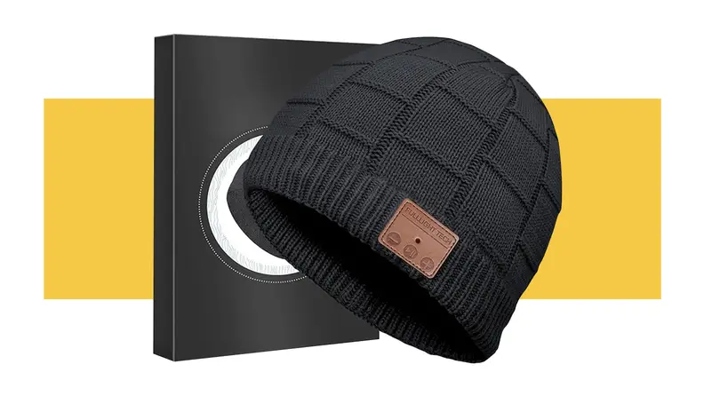 A black FullLight Tech Headphone Beanie against a yellow background