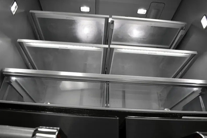 Each one of these shelves cuts into this KitchenAid's advertised storage.