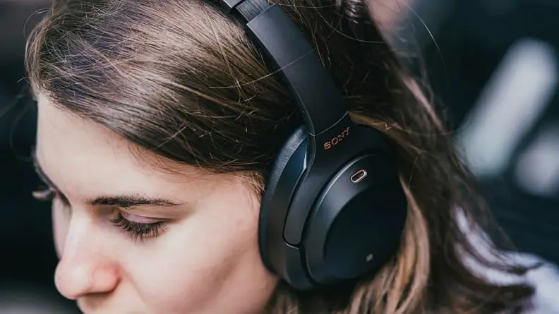 Woman using Sony headphones