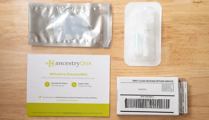 The contents of an AncestryDNA test kit,