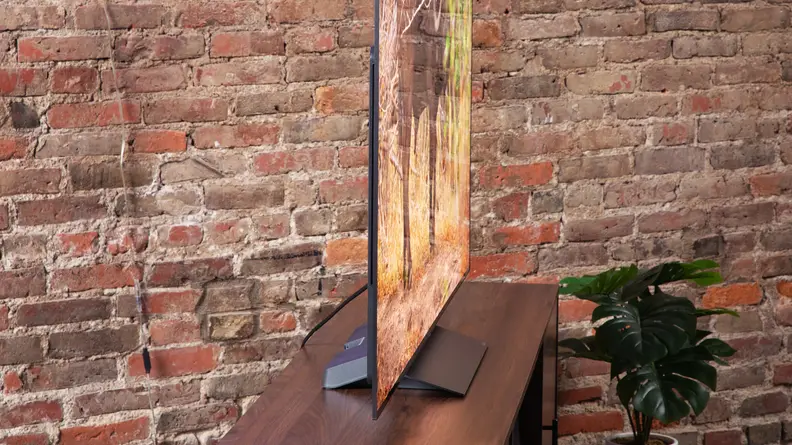 Profile image of the LG C3 OLED TV, showing its thin design.