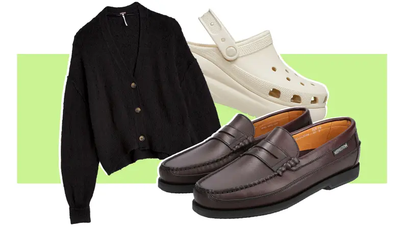 A black cardigan, a pair of brown leather loafers, and a white Croc clog.
