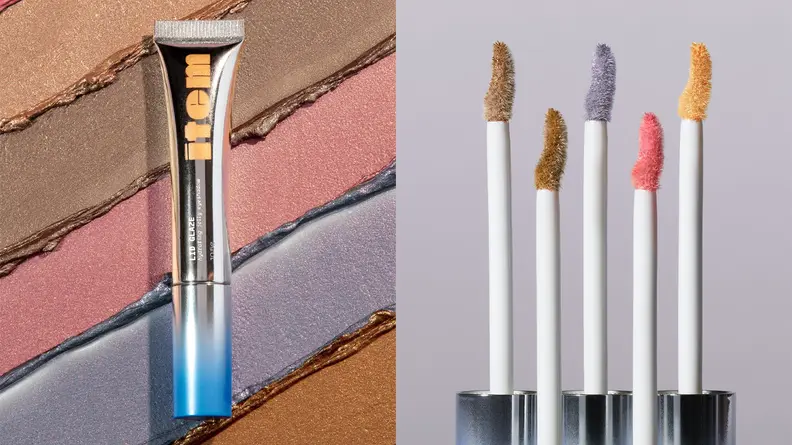 On the left: The Item Beauty Lid Glaze in its silver tube and the background is swatched with five shades of the liquid eyeshadow. On the right: Five Lid Glaze wands of different colors standing up on a gray background.