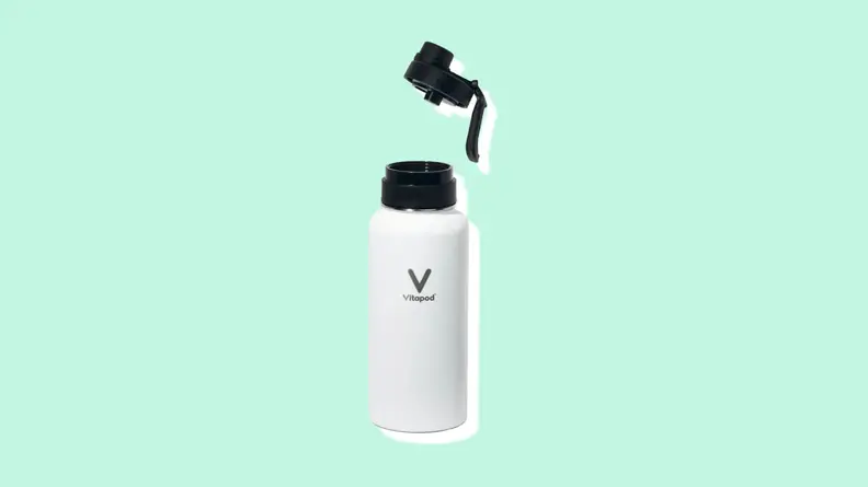 White insulated Vitapod reusable water bottle with cap unscrewed.