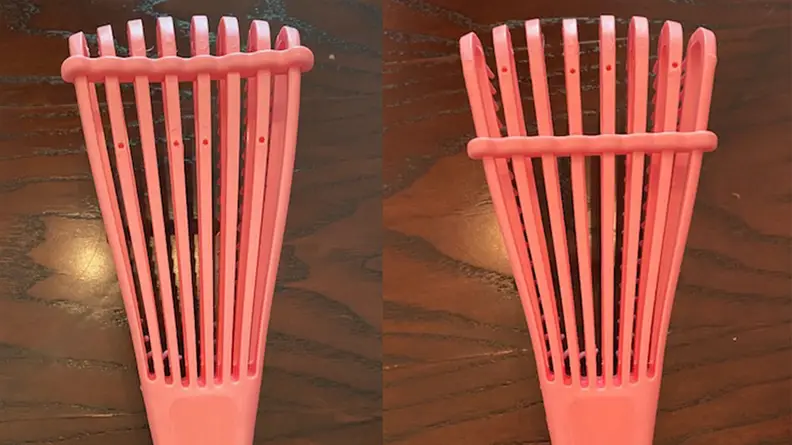 A photo of the clip on the back of the EZ Detangler Brush.