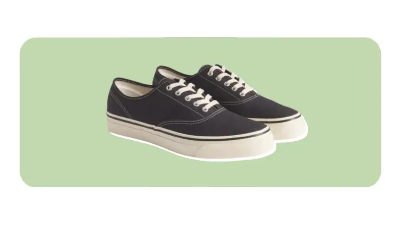 Photo of Buck Mason Herringbone Moonstar Deck Shoes on a green background