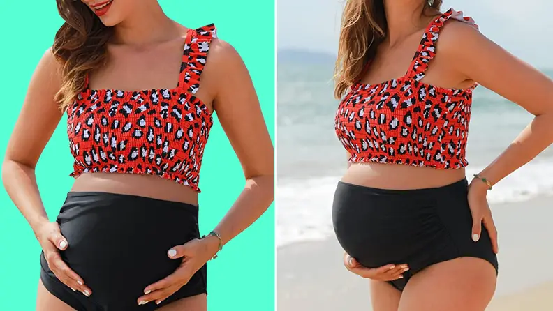 Pregnant person wearing red and black floral two-piece swimsuit.