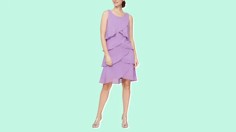 A lavender-colored chiffon dress from SL Fashions against a mint green background.
