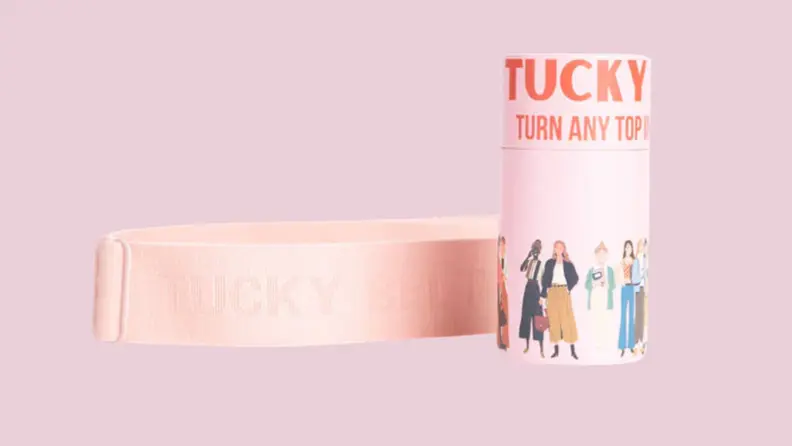 The Original Tucky belt next to a Tucky cylinder package