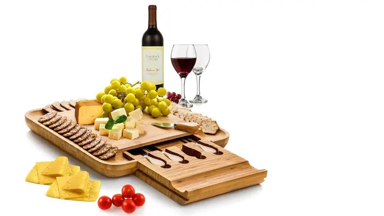 Cheeseboard with snacks and wine