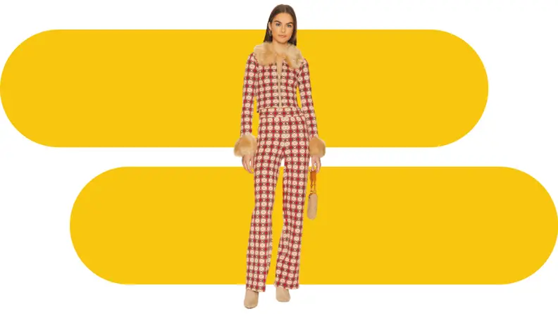 A model wearing printed knitwear separates.