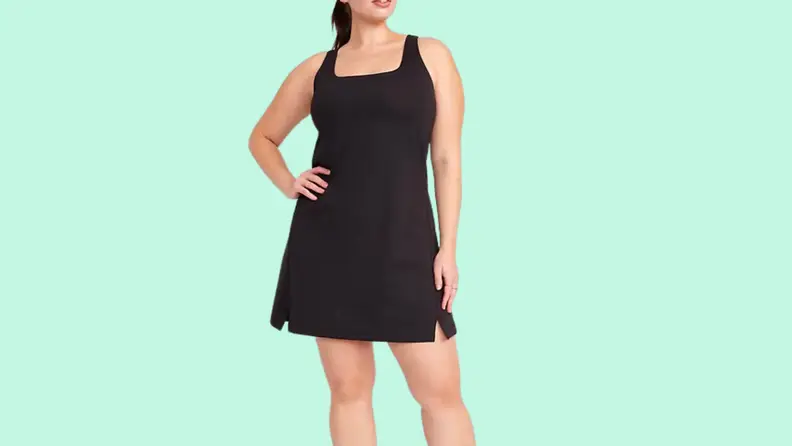 Woman in black exercise dress.
