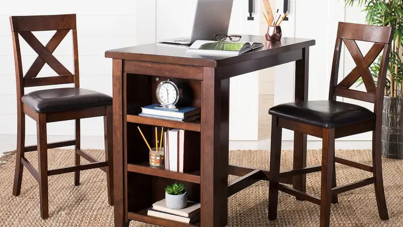 Wooden table that looks like desk with two chairs.