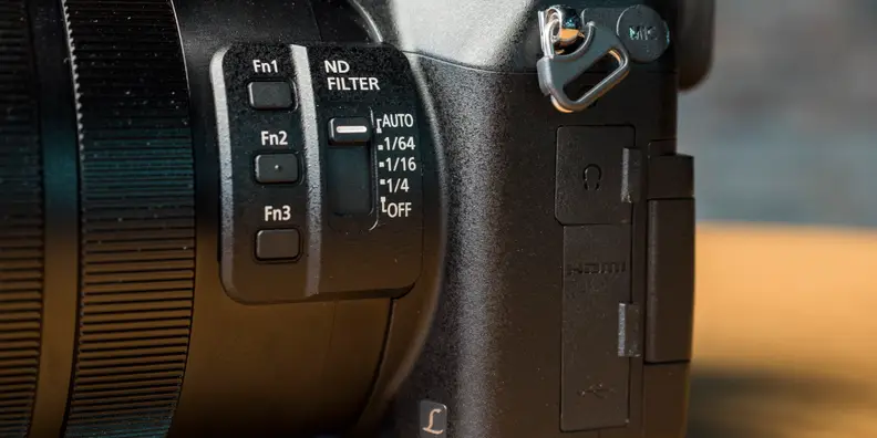 The large lens barrel is put to good use on the FZ2500/FZ2000 with typical camcorder controls like function buttons and an ND filter slider.