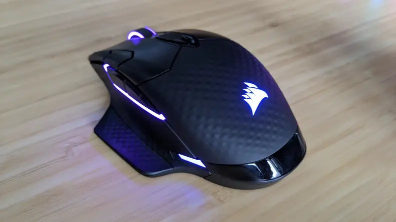 A computer mouse on top of a desk