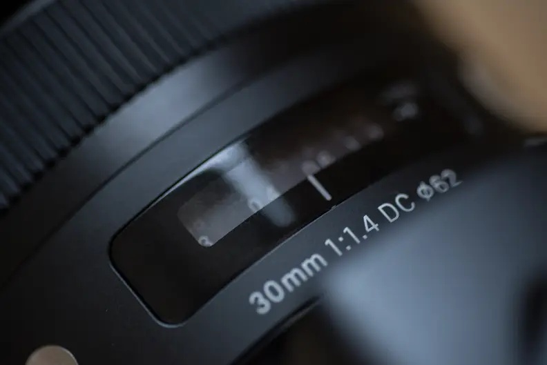 The focus scale is a nice touch, particularly given the new 30mm f/1.4's improved focusing capabilities.