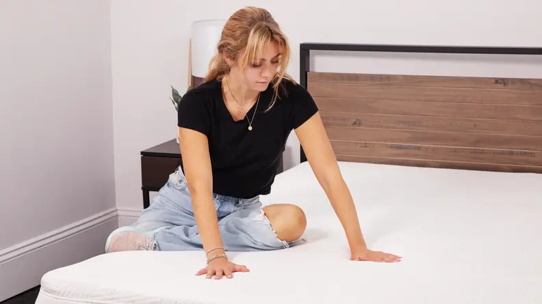 Woman sitting on Casper Snow