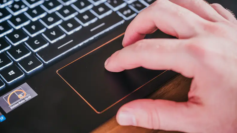 Person uses the trackpad