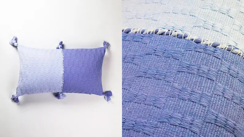 A purple throw pillow.
