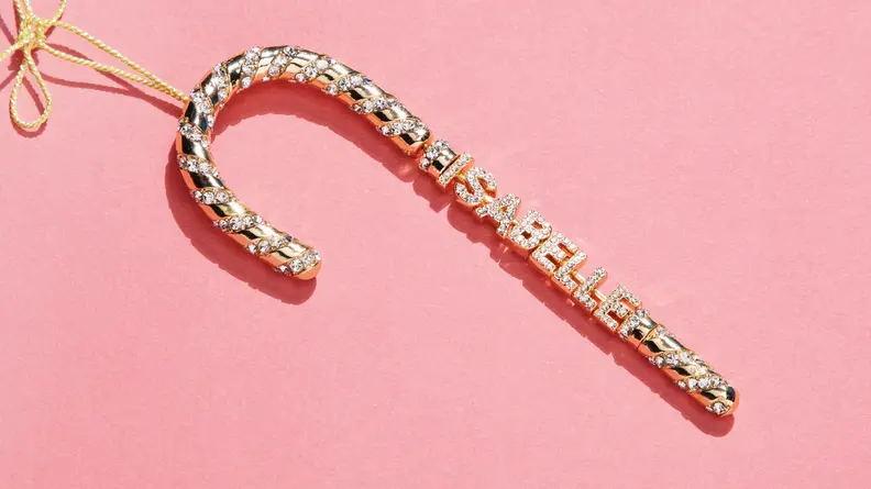 gold ornament on pink background