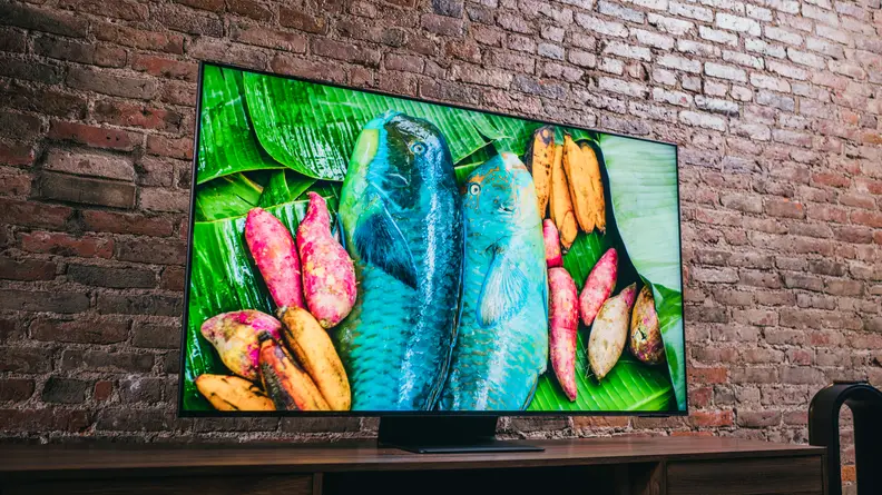 The Samsung QN90A displaying 4K/HDR content in a living room setting