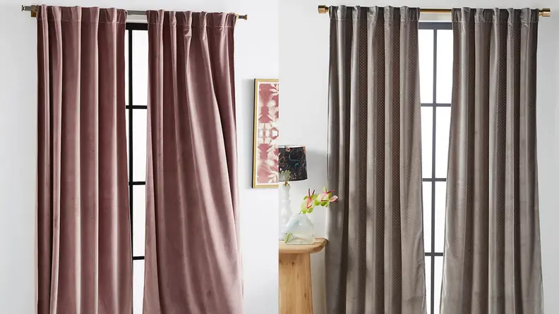 A set mauve and brown velvet curtains.