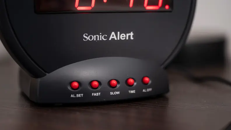 a close up of the buttons on the bottom of the sonic bomb alarm