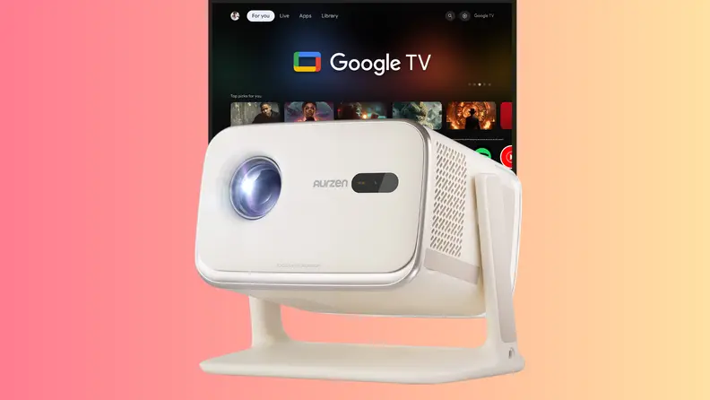 A compact Aurzen projector sits on a stand in front of a Google TV interface, highlighting its smart streaming and home entertainment capabilities showcased at CES 2026.
