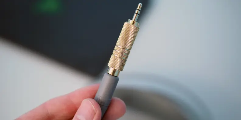 The K701s are designed for a studio, but feature an adapter to be used with standard 3.5mm ports also, and they don't require an amp.