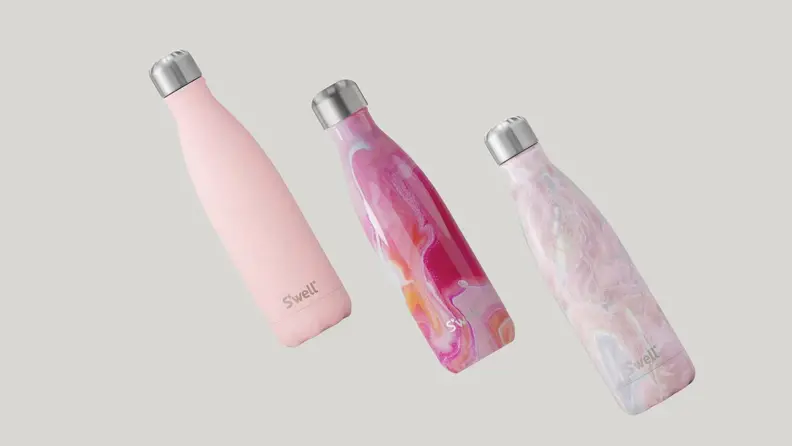 Three pink S'well water bottles