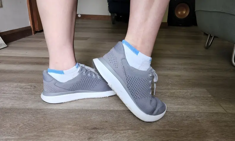 Side view of gray Kizik sneakers