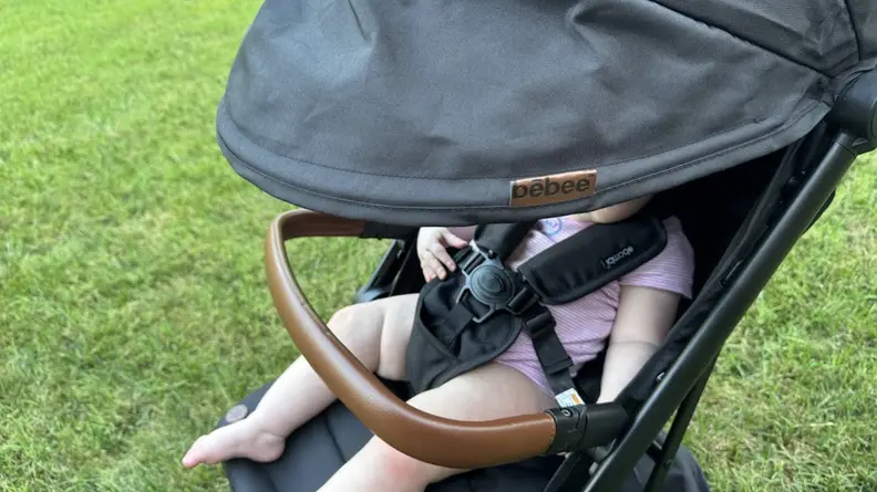 Baby sitting in the Bombi Bebee stroller
