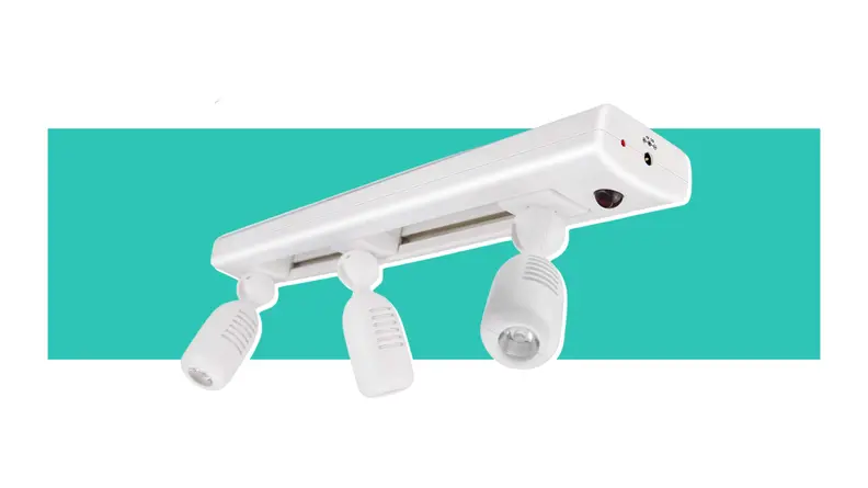 The Biglight LED Track Light in front of a white and green background.